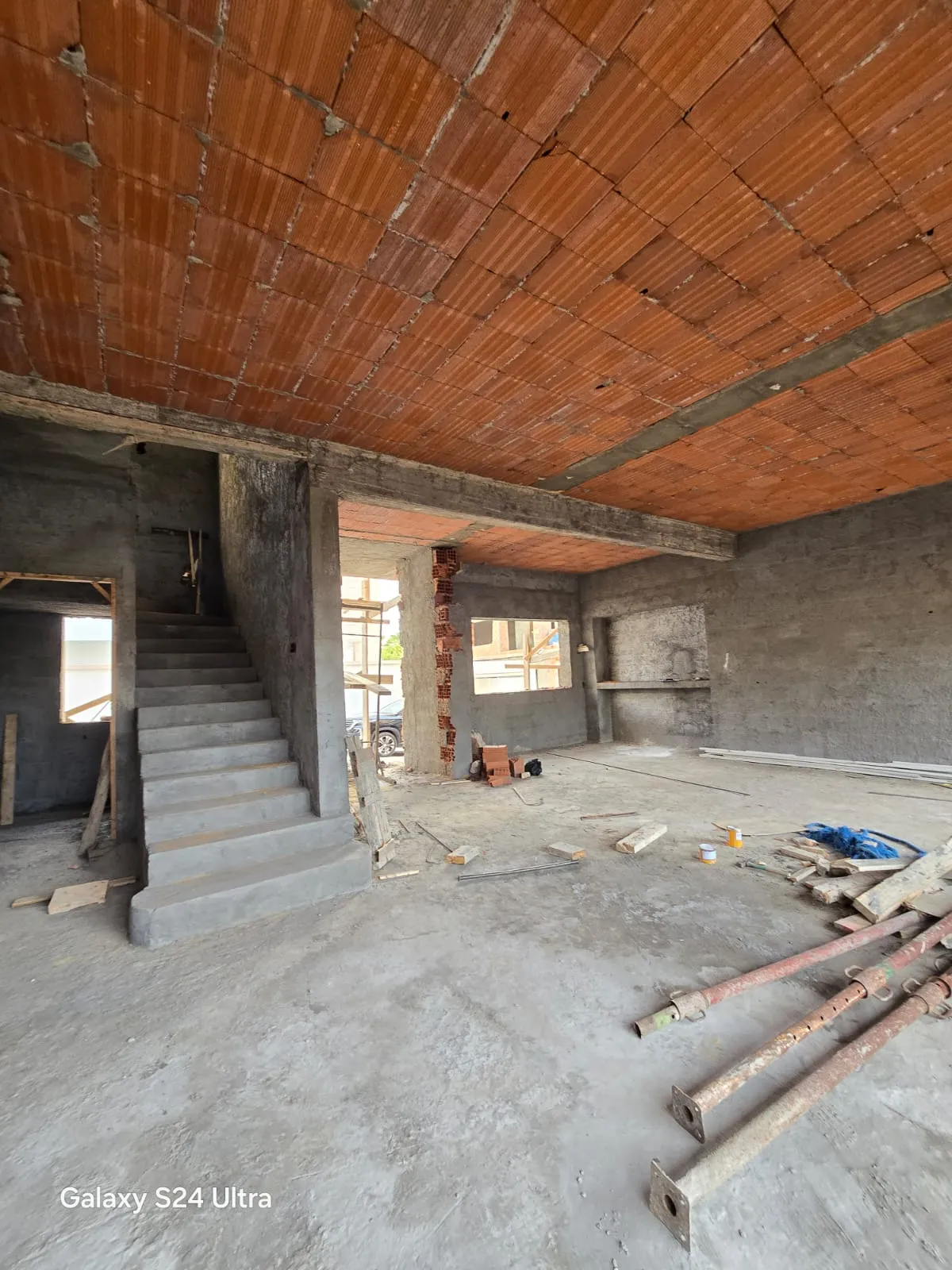Rendu 3D du séjour d’une maison conçue par Armonia — état initial, vue 2